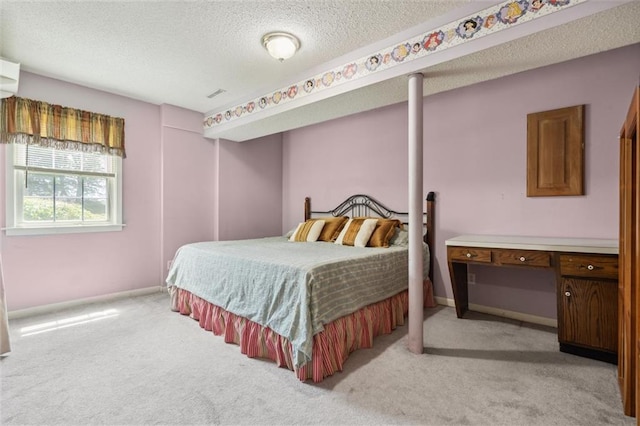 2106 Kasold Dr, Lawrence, KS 66047 - bedroom featuring baseboards, a textured ceiling, visible vents, and light carpet