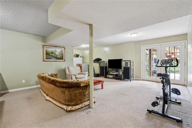 2106 Kasold Dr, Lawrence, KS 66047 - living room featuring baseboards, carpet, french doors, and a textured ceiling