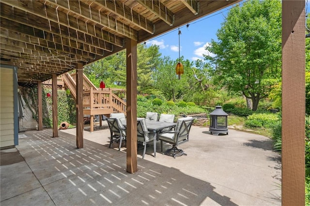 2106 Kasold Dr, Lawrence, KS 66047 - view of patio / terrace featuring stairway and outdoor dining space