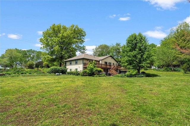 2106 Kasold Dr, Lawrence, KS 66047 - view of yard featuring a wooden deck