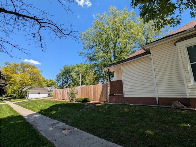 100 E 11th St, Horton, KS 66439 - view of property exterior with a yard and fence