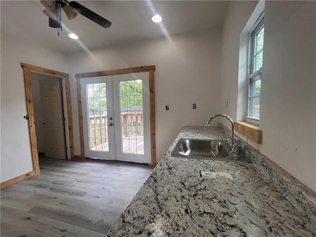 101 S Andrick St, Fort Scott, KS 66701 - kitchen with a sink, light wood-style floors, french doors, a ceiling fan, and recessed lighting