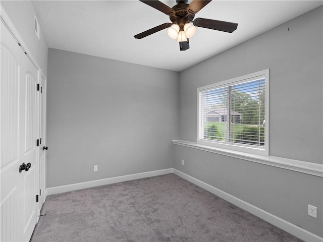 5084 NW Timberline Dr, Riverside, MO 64150 - unfurnished room featuring baseboards, ceiling fan, carpet flooring, and visible vents