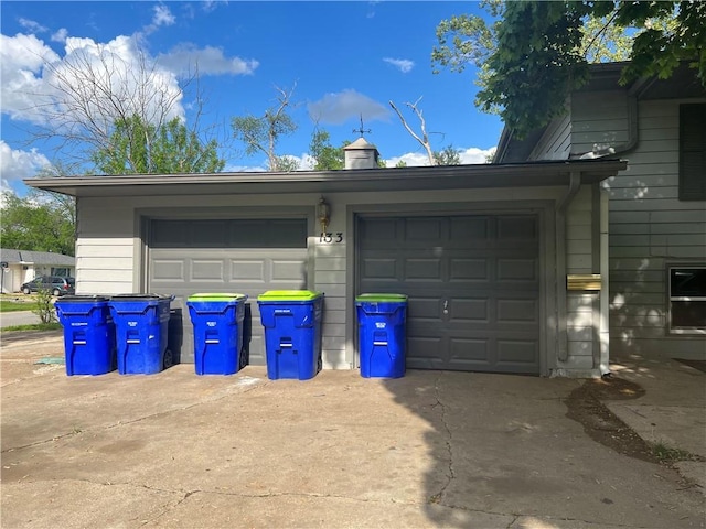 garage with driveway