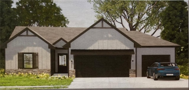 english style home with an attached garage and driveway