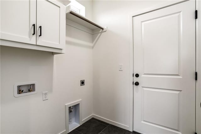 16502 S Stagecoach St, Olathe, KS 66062 - washroom with cabinet space, hookup for an electric dryer, baseboards, dark tile patterned floors, and washer hookup