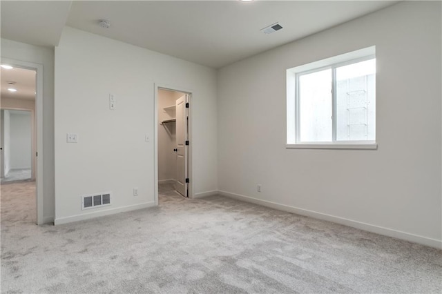 16502 S Stagecoach St, Olathe, KS 66062 - unfurnished bedroom featuring carpet flooring, a spacious closet, and baseboards