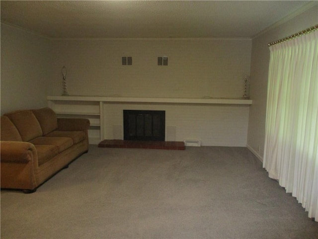 living room with carpet floors, visible vents, and ornamental molding