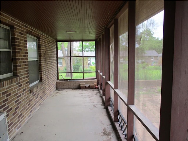 unfurnished sunroom featuring plenty of natural light