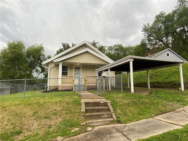 view of front of property with fence, a gate, covered porch, and a front yard