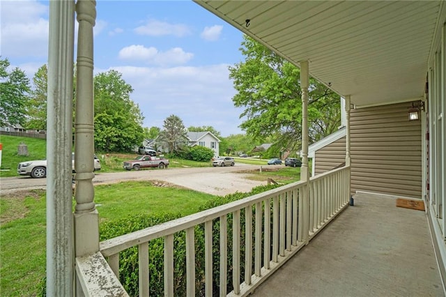 15 Baber Cir, Camden Point, MO 64018 - balcony with covered porch and a residential view