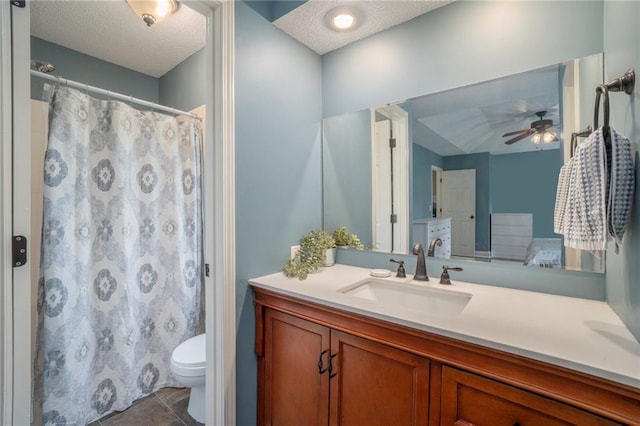 15 Baber Cir, Camden Point, MO 64018 - bathroom with a textured ceiling, toilet, ceiling fan, vanity, and a shower with curtain