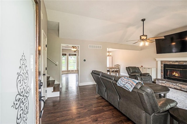 15 Baber Cir, Camden Point, MO 64018 - living room featuring ceiling fan, dark wood-style floors, stairs, a fireplace, and vaulted ceiling