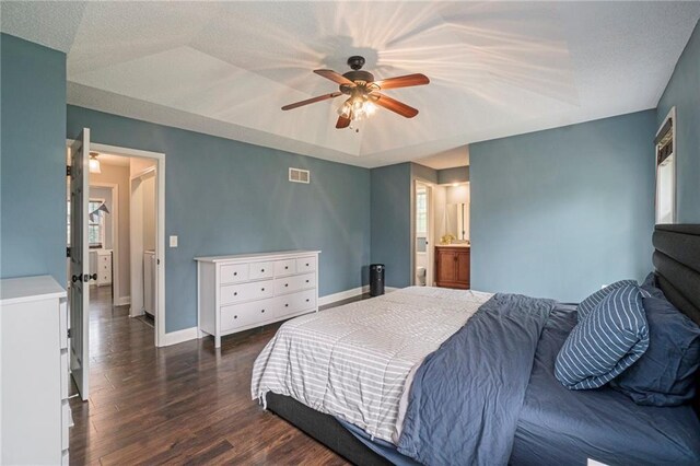 15 Baber Cir, Camden Point, MO 64018 - bedroom featuring dark wood finished floors, baseboards, ceiling fan, and ensuite bathroom