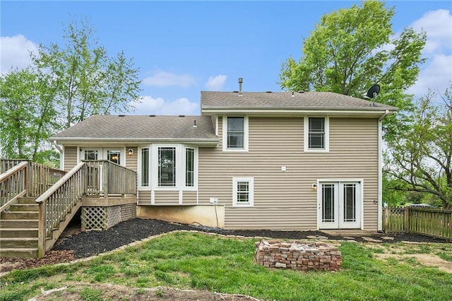15 Baber Cir, Camden Point, MO 64018 - back of property with a wooden deck