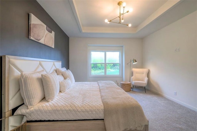 16567 S Stagecoach St, Olathe, KS 66062 - bedroom with a tray ceiling, a chandelier, and baseboards
