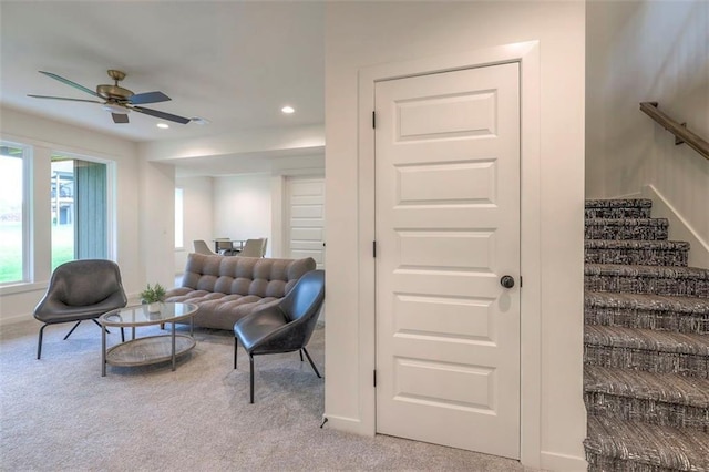 16567 S Stagecoach St, Olathe, KS 66062 - living room with carpet floors, ceiling fan, recessed lighting, stairs, and baseboards