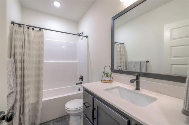 16567 S Stagecoach St, Olathe, KS 66062 - bathroom with vanity, toilet, shower / bath combo with shower curtain, and tile patterned flooring