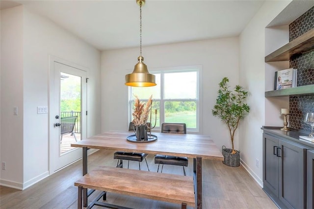 16567 S Stagecoach St, Olathe, KS 66062 - dining area featuring plenty of natural light, light wood finished floors, and baseboards
