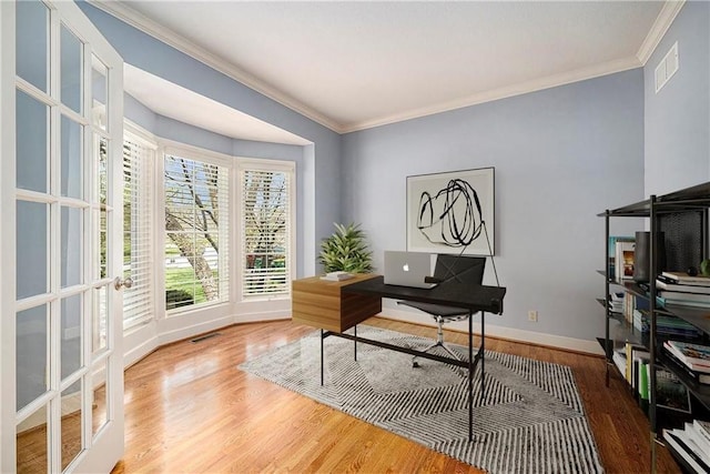 14475 Chadwick St, Leawood, KS 66224 - office area with baseboards, visible vents, ornamental molding, and wood finished floors
