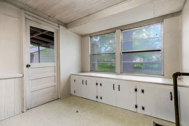 spare room with light speckled floor