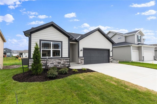 17122 W 168th Pl, Olathe, KS 66062 - view of front of home with an attached garage, driveway, and a front lawn