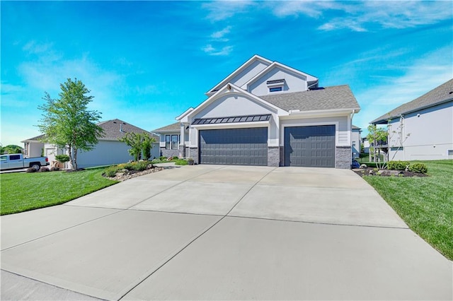 view of front of home featuring an attached garage, a front lawn, concrete driveway, and stone siding