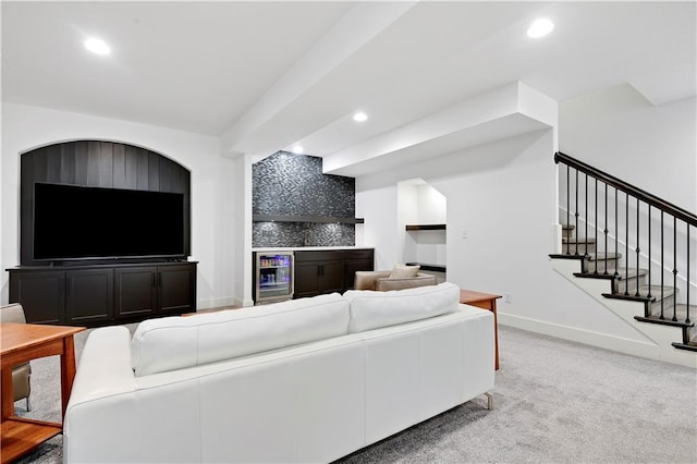 living area with beverage cooler, recessed lighting, stairs, carpet, and baseboards