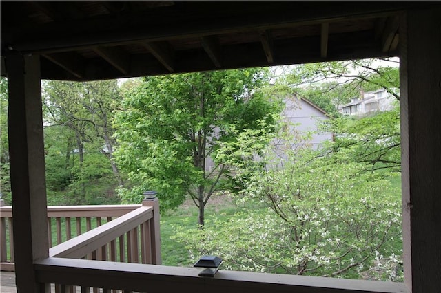 6726 Mill Creek Rd, Shawnee, KS 66217 - view of yard with a wooden deck and a forest view