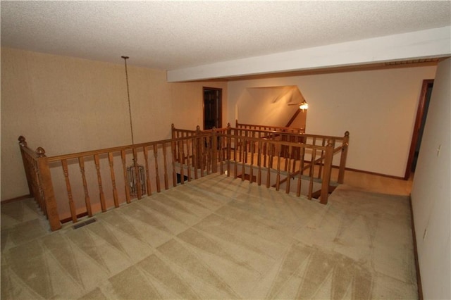 6726 Mill Creek Rd, Shawnee, KS 66217 - carpeted spare room featuring a textured ceiling
