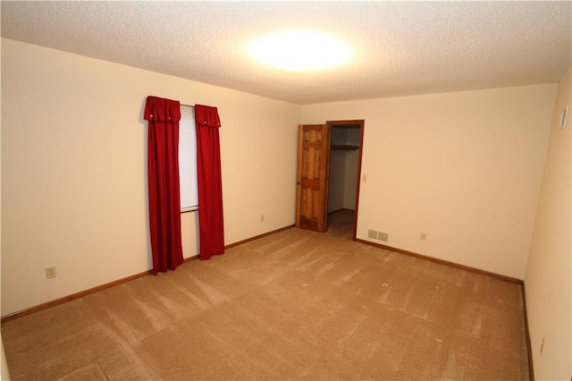 6726 Mill Creek Rd, Shawnee, KS 66217 - unfurnished bedroom featuring carpet, a textured ceiling, and baseboards