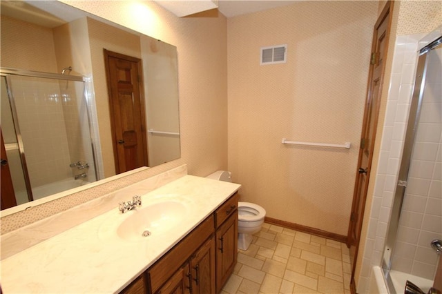 6726 Mill Creek Rd, Shawnee, KS 66217 - bathroom featuring vanity, toilet, and bathing tub / shower combination