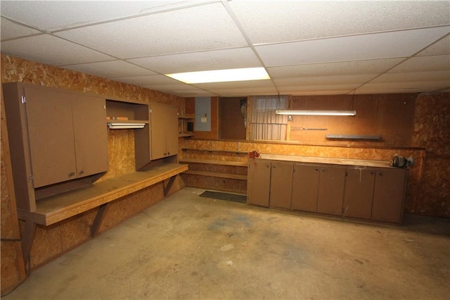 6726 Mill Creek Rd, Shawnee, KS 66217 - finished basement with a drop ceiling and wooden walls