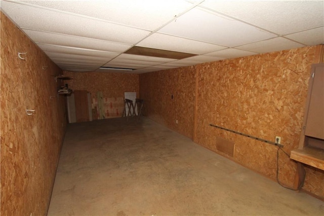 6726 Mill Creek Rd, Shawnee, KS 66217 - finished basement with a paneled ceiling and carpet floors