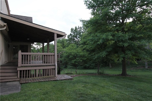 6726 Mill Creek Rd, Shawnee, KS 66217 - view of grassy yard with a deck