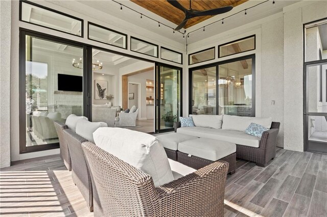 11201 W 169th St, Overland Park, KS 66221 - view of patio / terrace with a ceiling fan and an outdoor hangout area
