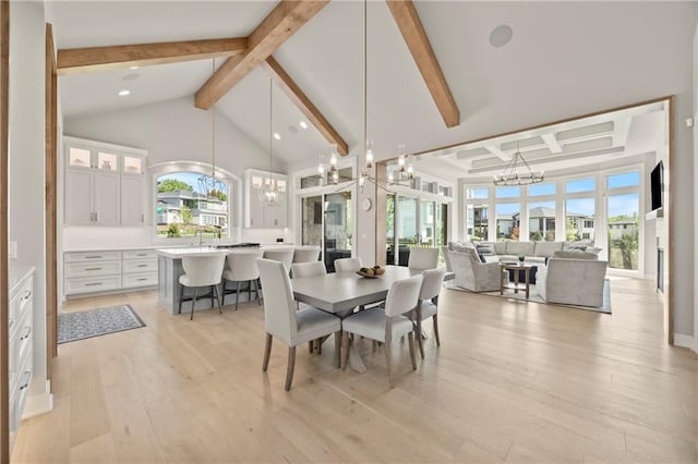 11201 W 169th St, Overland Park, KS 66221 - dining room with a chandelier, light wood-style flooring, and recessed lighting