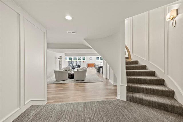 11201 W 169th St, Overland Park, KS 66221 - stairway with wood finished floors and recessed lighting