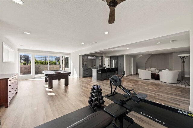 11201 W 169th St, Overland Park, KS 66221 - workout room with billiards table, light wood-style flooring, recessed lighting, ceiling fan, and baseboards