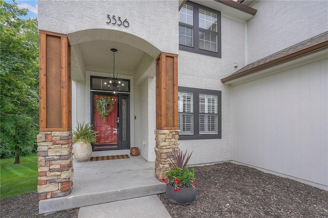3536 SW Dana Ave E, Lees Summit, MO 64082 - property entrance featuring stucco siding and stone siding