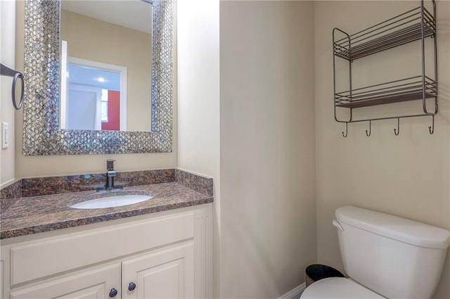 3536 SW Dana Ave E, Lees Summit, MO 64082 - bathroom featuring toilet and vanity