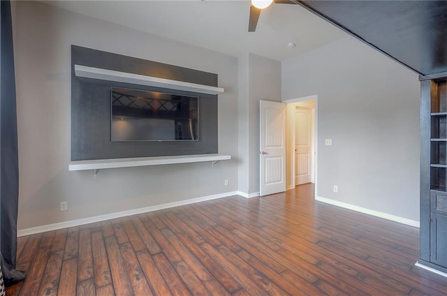 3536 SW Dana Ave E, Lees Summit, MO 64082 - unfurnished living room with ceiling fan, wood-type flooring, and baseboards