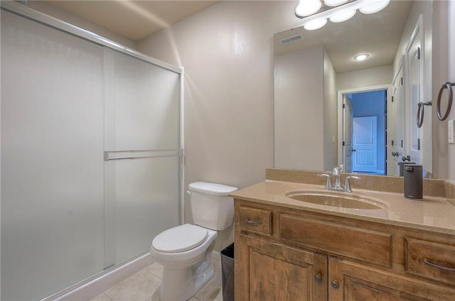 3536 SW Dana Ave E, Lees Summit, MO 64082 - bathroom with vanity, toilet, tile patterned flooring, and a stall shower