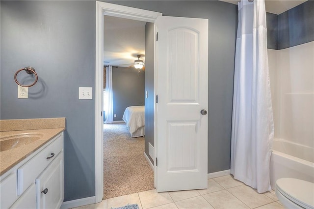 3536 SW Dana Ave E, Lees Summit, MO 64082 - bathroom featuring a ceiling fan, vanity, tile patterned floors, toilet, and baseboards
