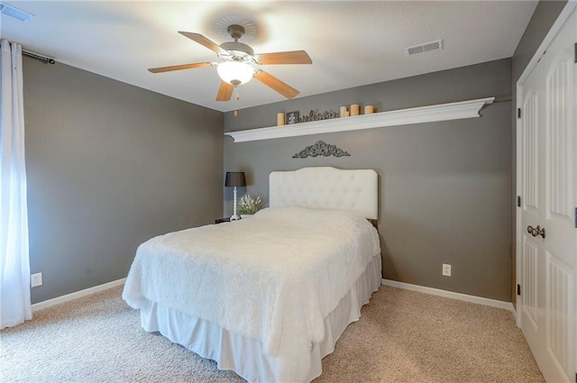 3536 SW Dana Ave E, Lees Summit, MO 64082 - bedroom featuring light colored carpet, baseboards, and ceiling fan