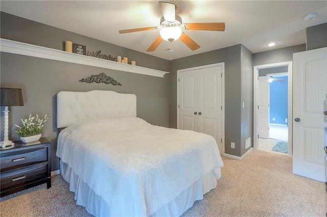 3536 SW Dana Ave E, Lees Summit, MO 64082 - bedroom featuring light carpet, a closet, baseboards, a ceiling fan, and recessed lighting