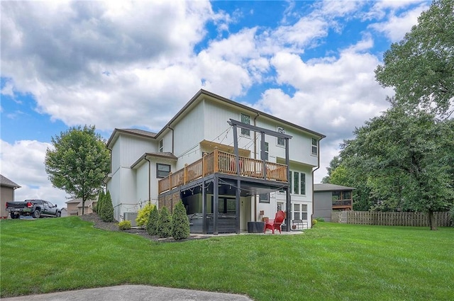 3536 SW Dana Ave E, Lees Summit, MO 64082 - rear view of house with a deck, central AC unit, and a patio