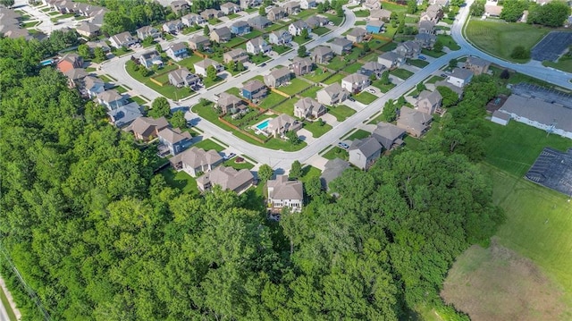 3536 SW Dana Ave E, Lees Summit, MO 64082 - aerial view of property and surrounding area with nearby suburban area