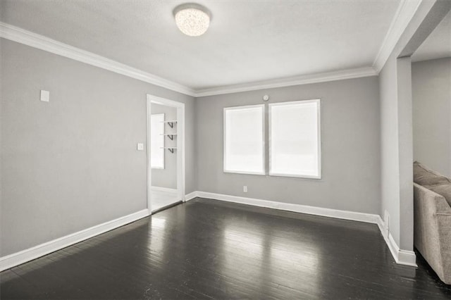 6101 Swope Pkwy, Kansas City, MO 64130 - spare room featuring ornamental molding and wood finished floors
