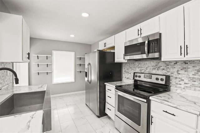 6101 Swope Pkwy, Kansas City, MO 64130 - kitchen with appliances with stainless steel finishes, light marble finish flooring, open shelves, white cabinets, and recessed lighting